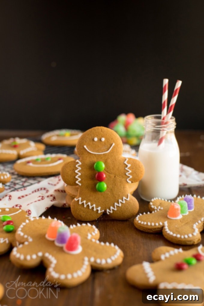 Decorated Gingerbread Man Cookie and Milk A charming scene featuring a decorated gingerbread man cookie next to a bottle of milk, embodying cozy holiday vibes.