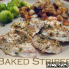 Perfectly Baked Striped Bass 2 A close up photo of baked striper on a plate with brussels sprouts in the background.