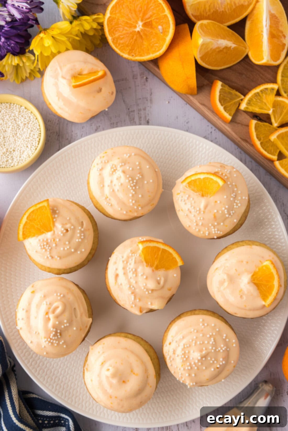 Orange Dream Swirl Cupcakes 15 A beautifully arranged plate of Orange Creamsicle Cupcakes, garnished and ready to serve.
