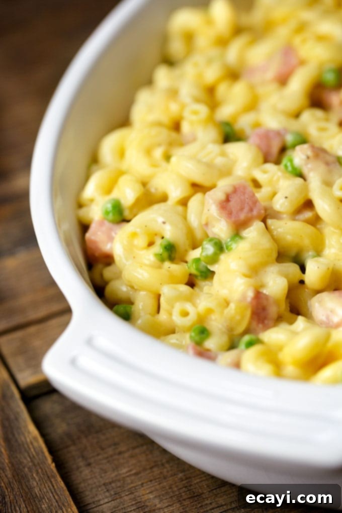 Creamy Ham and Pea Mac and Cheese Casserole 3 Macaroni and Cheese with Ham and Peas, ready to bake