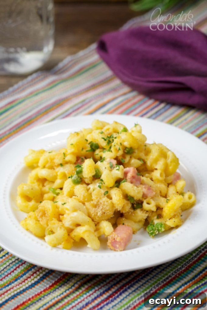 Creamy Ham and Pea Mac and Cheese Casserole 5 Delicious plate of Mac and Cheese Casserole with Ham and Peas