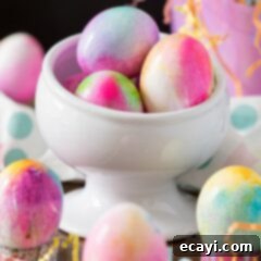 Vibrant Tie-Dye Easter Eggs 2 A bowl of vibrant, tie-dyed Easter eggs showcasing beautiful patterns