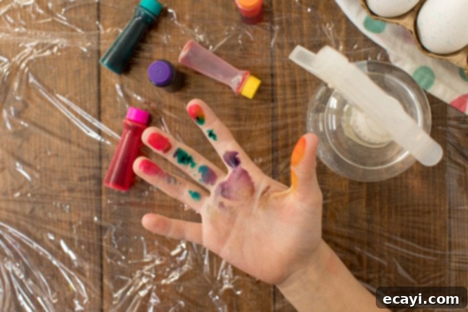 Easily remove food coloring stains from skin with these helpful tips. Hand showing food coloring stains on skin, with advice for removal