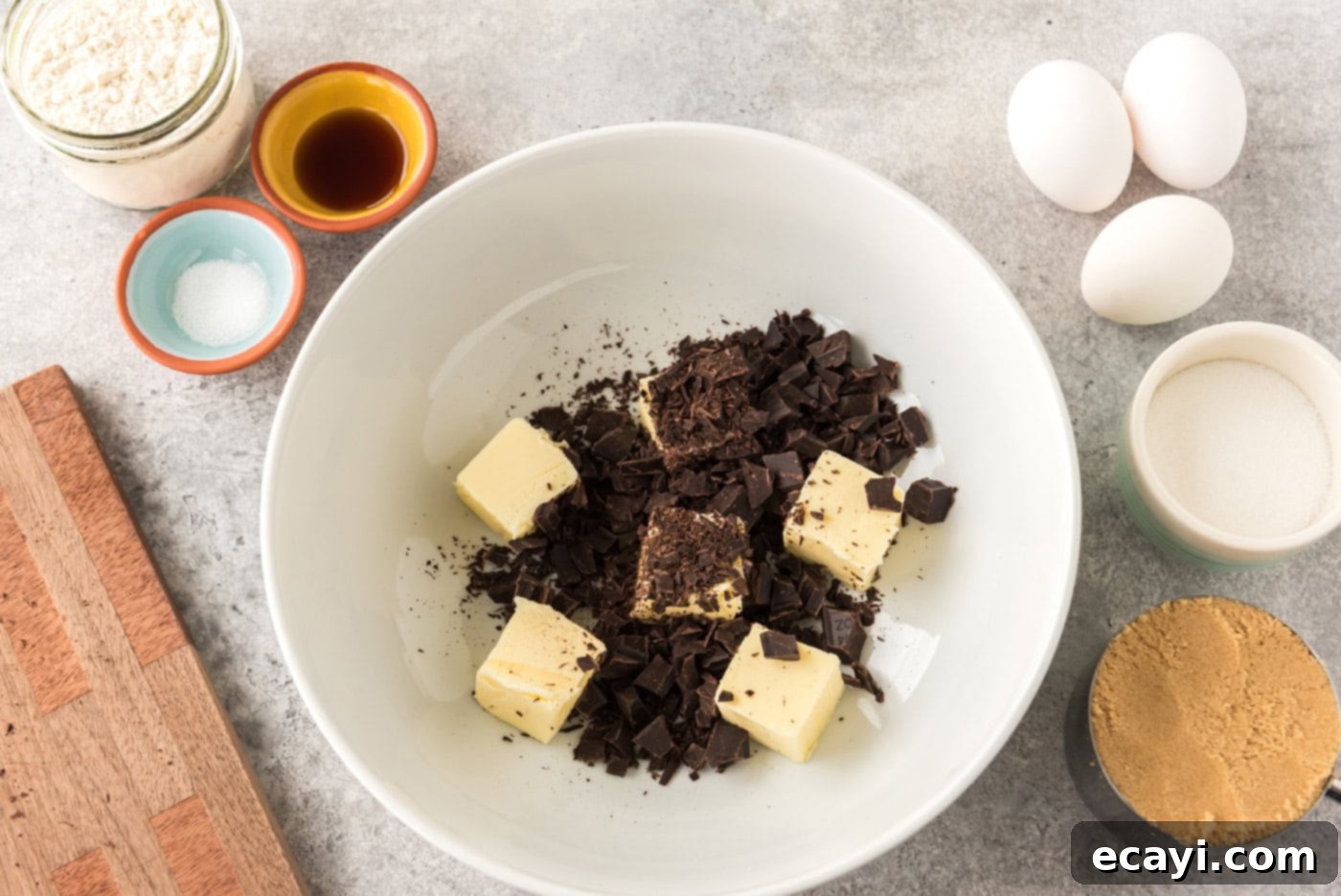 Deep Dish Peanut Butter Brownie 7 sliced butter pats with chopped chocolate in a bowl
