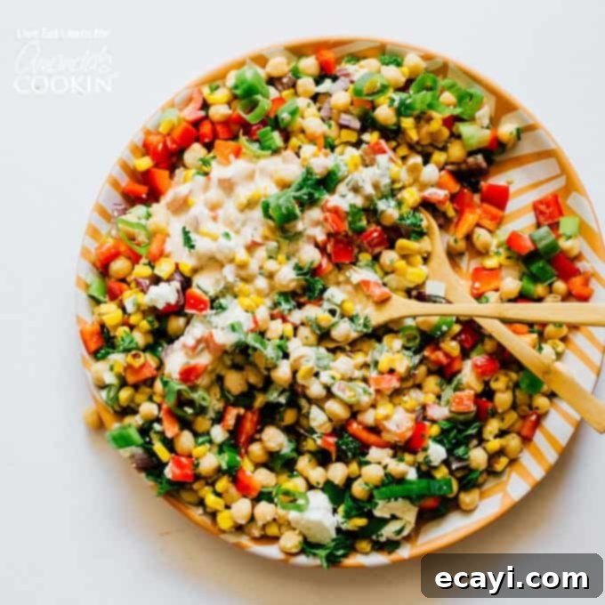 Garden Fresh Summer Quinoa Delight 12 colorful salad on a plate with spoons