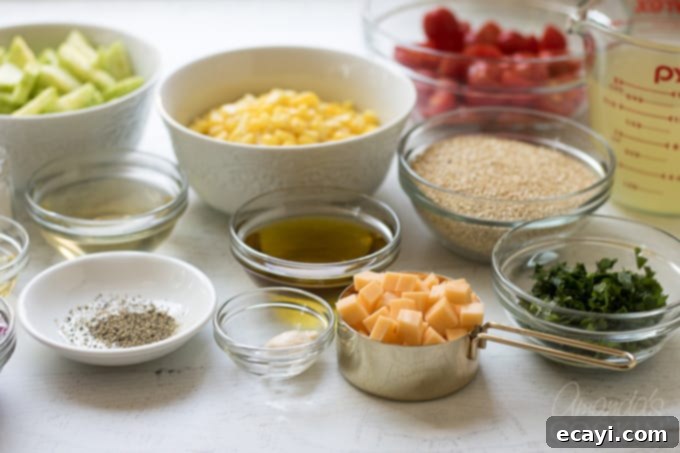 Garden Fresh Summer Quinoa Delight 3 A vibrant spread of fresh ingredients laid out, ready for making the summer vegetable quinoa salad.