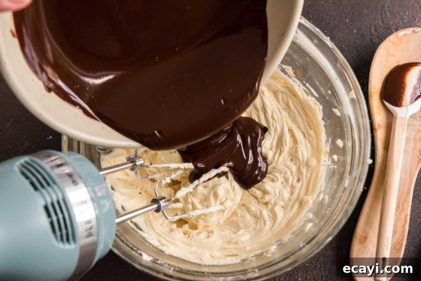 Decadent Chocolate Fudge Delight 21 adding melted chocolate to frosting