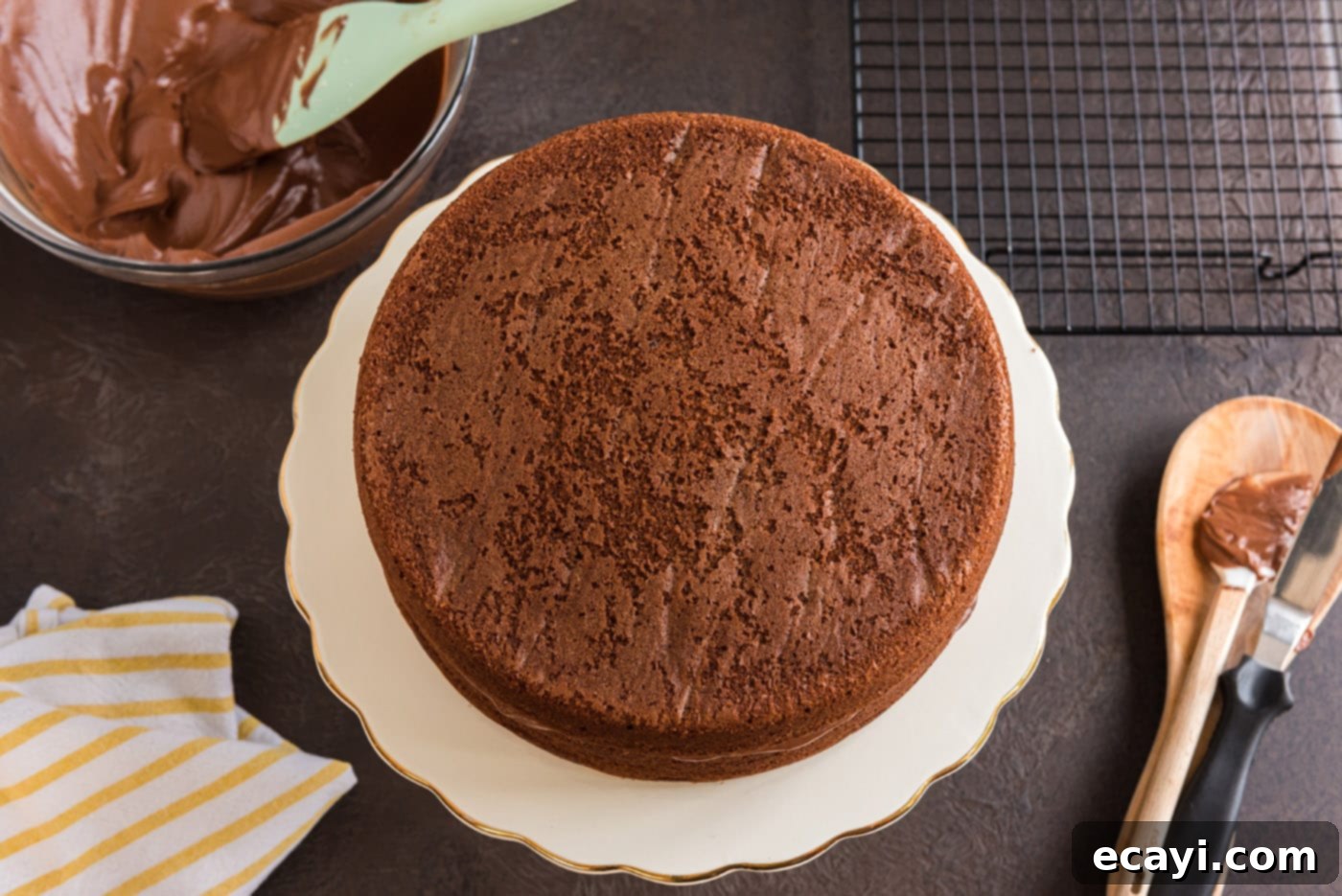 Decadent Chocolate Fudge Delight 24 layering round cake on top of one another