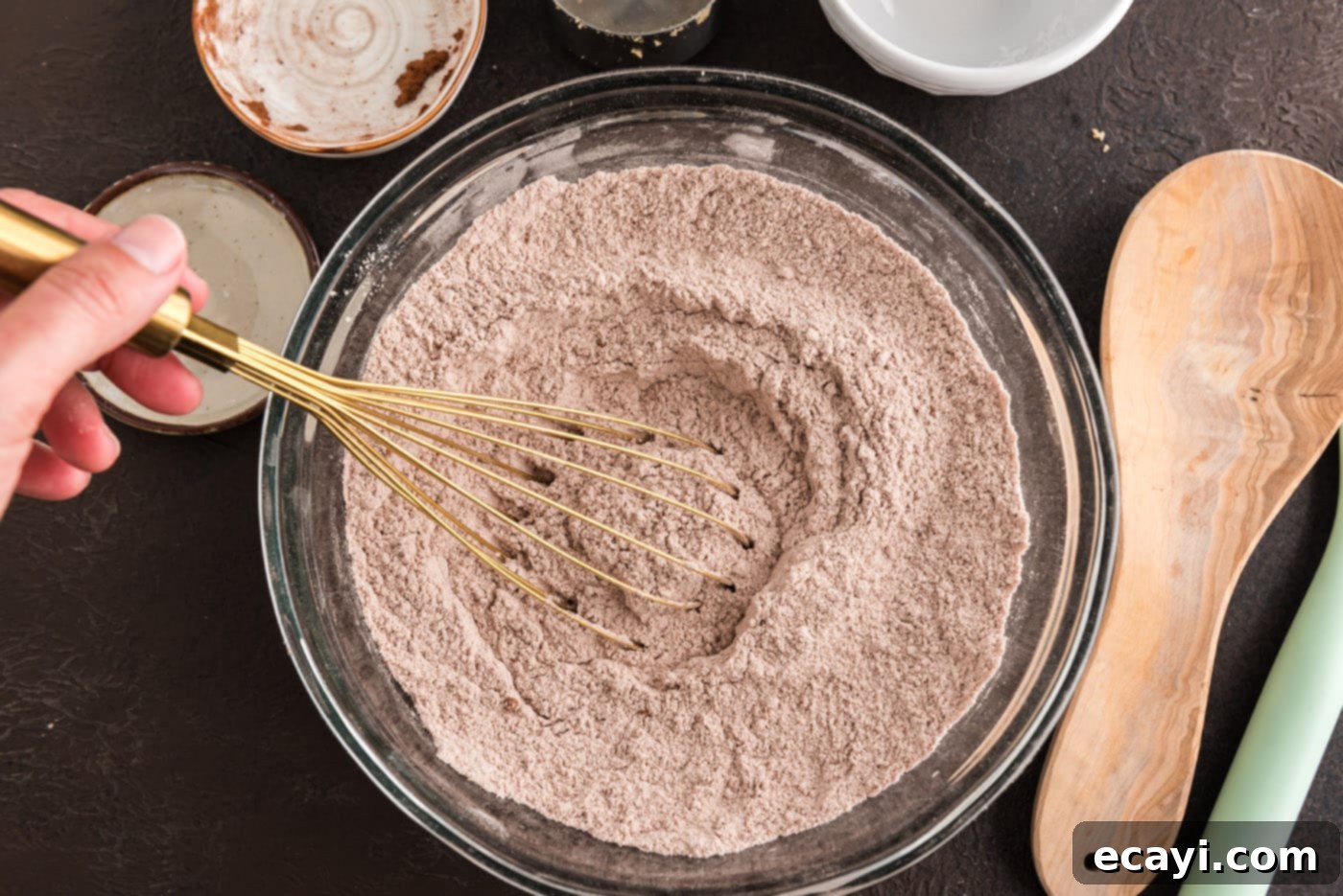Decadent Chocolate Fudge Delight 7 whisking together dry ingredients for chocolate cake
