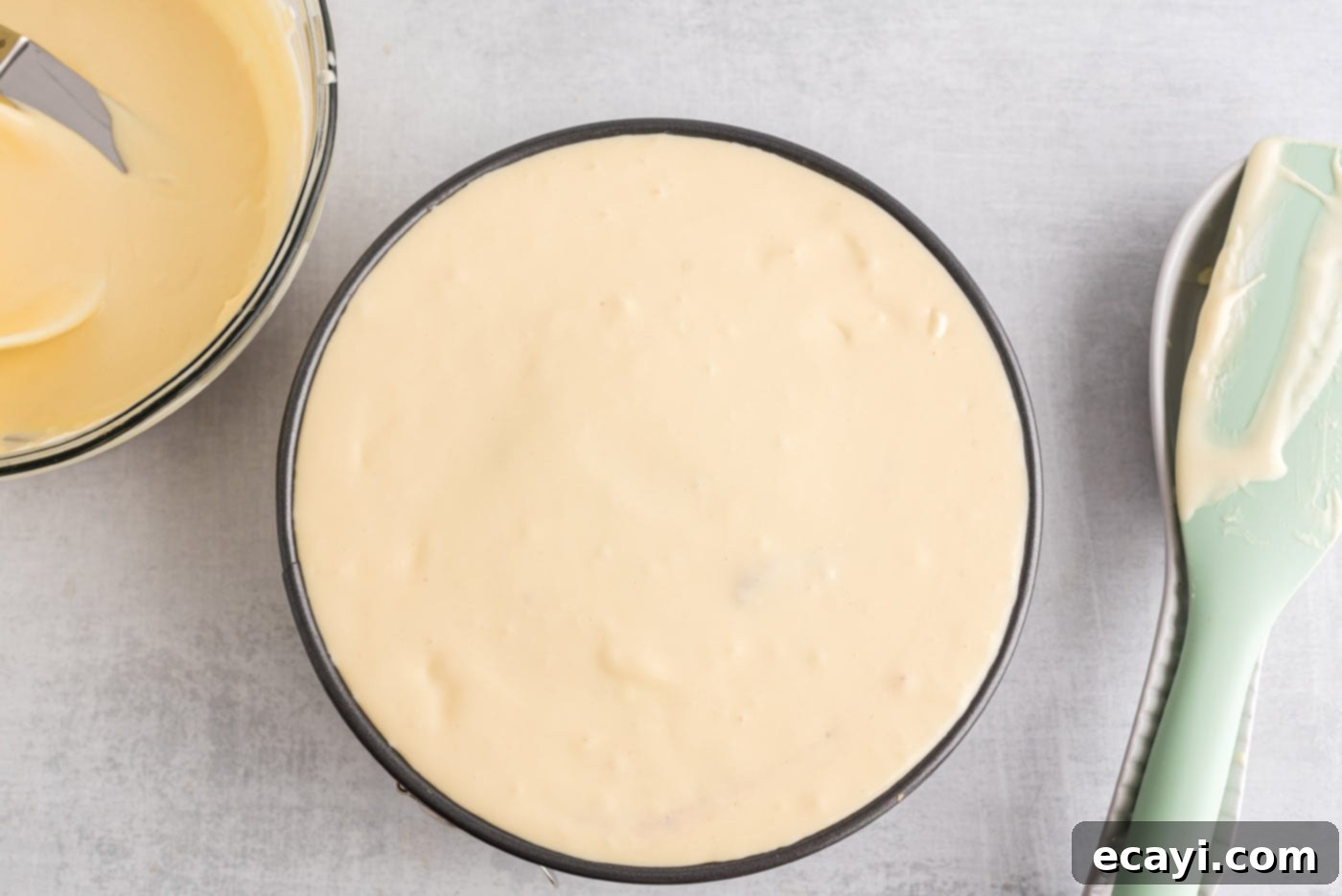 Regal Trifle Cheesecake 11 The springform pan now full of the English Trifle Cheesecake layers, topped with the final pour of cheesecake batter, ready for baking.