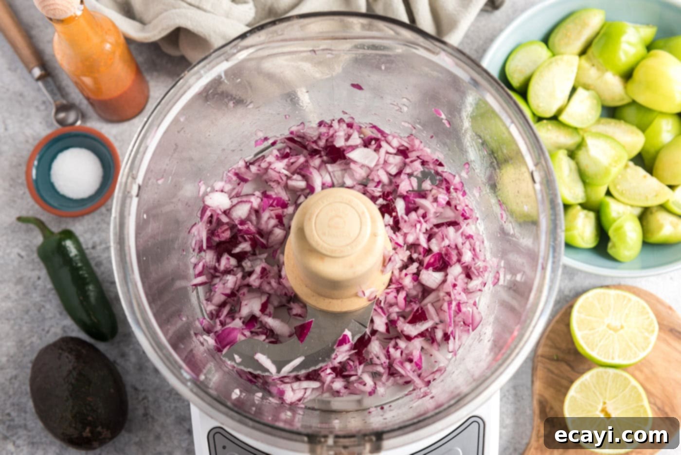Vibrant Tomatillo Avocado Onion Salsa 5 diced red onion in a food processor, after being pulsed and rinsed