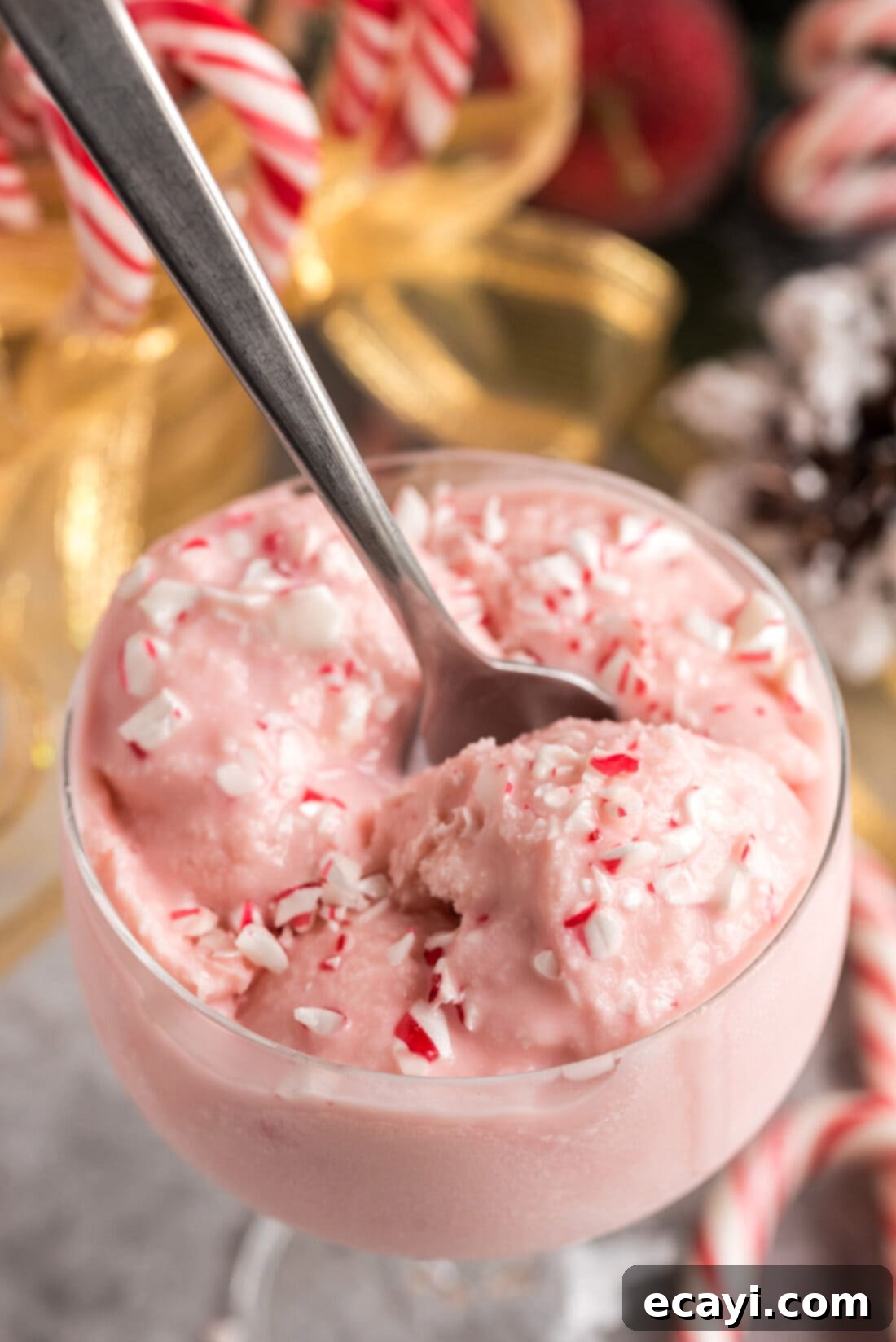 Cool Peppermint Bliss 3 Homemade Peppermint Ice Cream in a sundae cup with a spoon in it