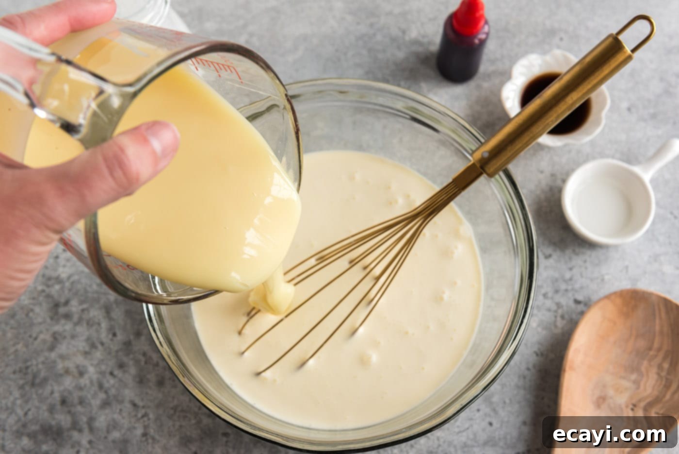 Cool Peppermint Bliss 5 pouring sweetened condensed milk into ice cream mixture