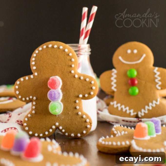 The Ultimate Christmas Cookie Collection: 12 Days 14 Gingerbread man cookie placed near a bottle of milk, embodying holiday spirit