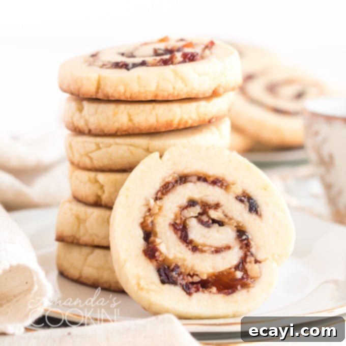 The Ultimate Christmas Cookie Collection: 12 Days 6 Stack of festive cranberry orange spiral cookies