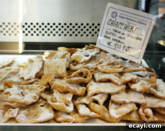 Chiacchiere: Fried (or baked) dough sprinkled with powdered sugar. A classic.  Chiacchiere: A classic Italian sweet of fried or baked dough, delicately sprinkled with powdered sugar