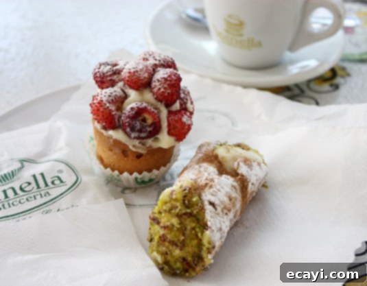 Coffee (and pastry) break at Spinella's, Catania, Sicily. Enjoying a delightful coffee and pastry break at Spinella's, a renowned pastry shop in Catania, Sicily