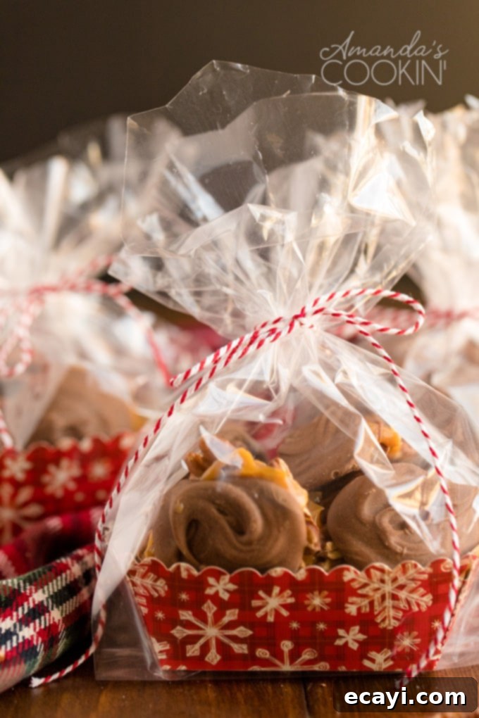 Homemade chocolate turtles packaged in cellophane gift bags, perfect for holiday gifts. Gift bags filled with homemade chocolate turtles, ready for sharing