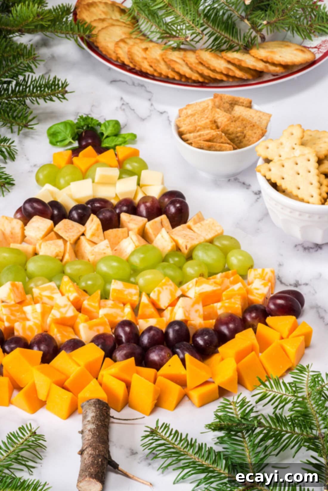 Festive Cheese Tree Board 3 Close up photo of a Christmas Tree Cheese Platter showcasing the arrangement of ingredients