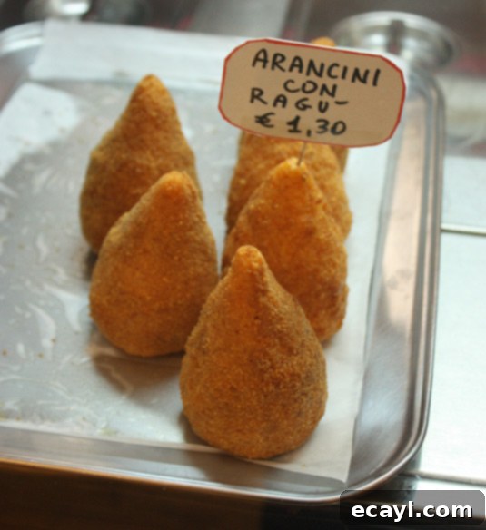 Mastering Authentic Sicilian Arancini 3 Cone-shaped arancini in Catania, Sicily