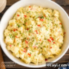 Mom's Classic Potato Salad 8 A generous bowl of homemade potato salad, ready to be served at a gathering.