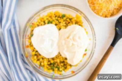 Fiesta Corn Dip 11 Bowl of corn with mayo and sour cream added