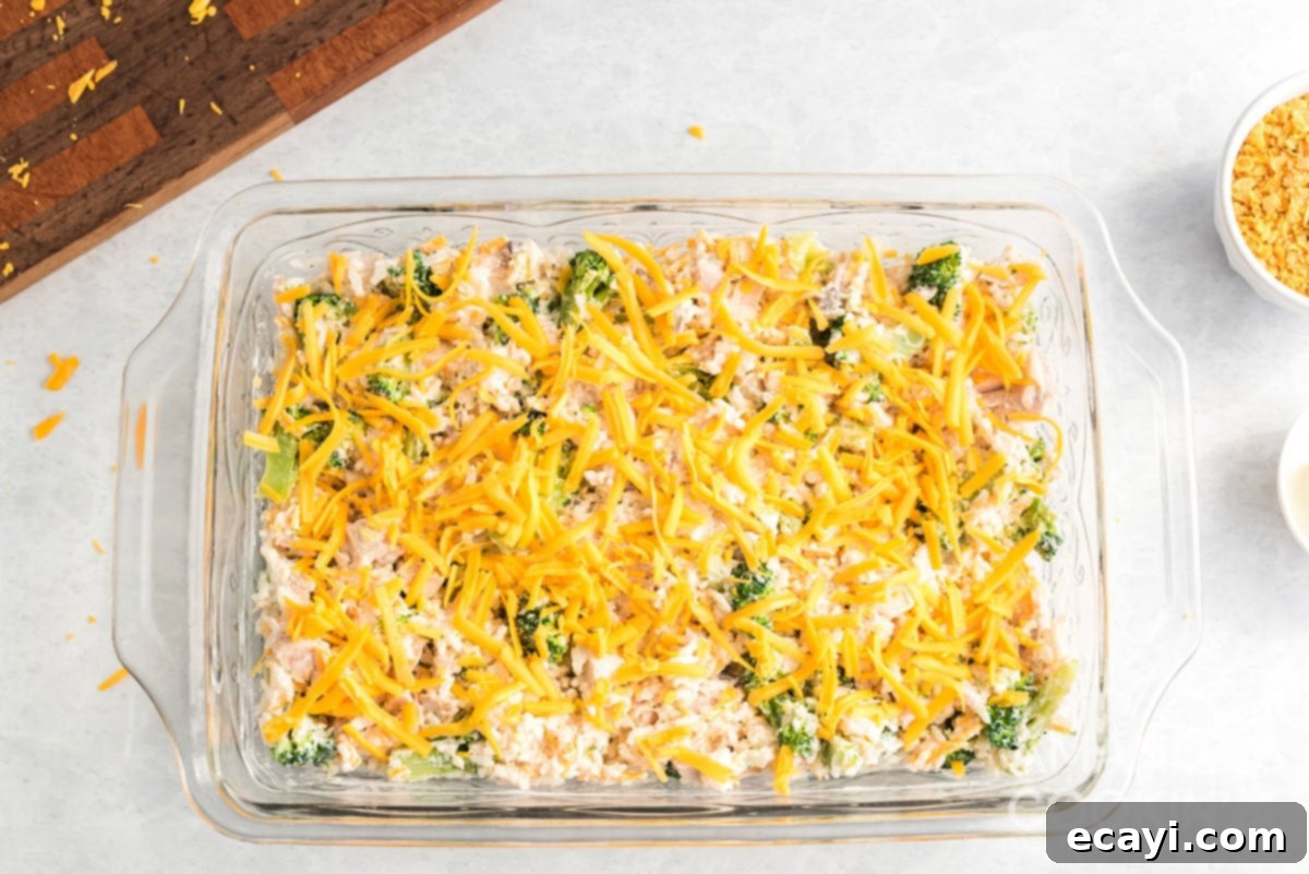 Creamy Chicken and Broccoli Rice Casserole 4 grated cheddar cheese on top of casserole before baking