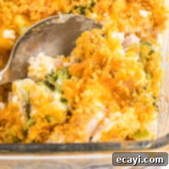 Creamy Chicken and Broccoli Rice Casserole 6 close up of spoon in Make Chicken Broccoli Rice Casserole