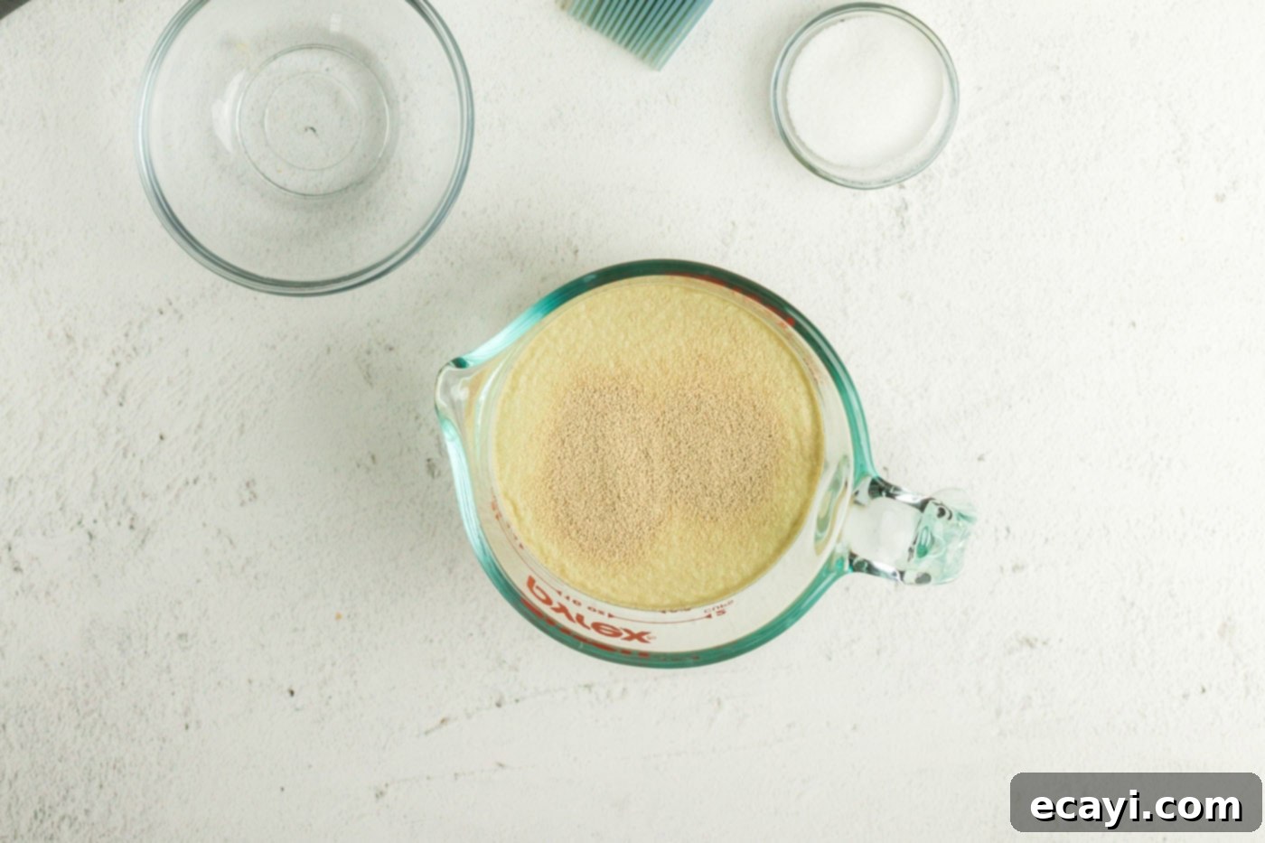 Perfectly Poppable Air Fried Pretzels 6 Yeast added to a liquid measuring cup of water