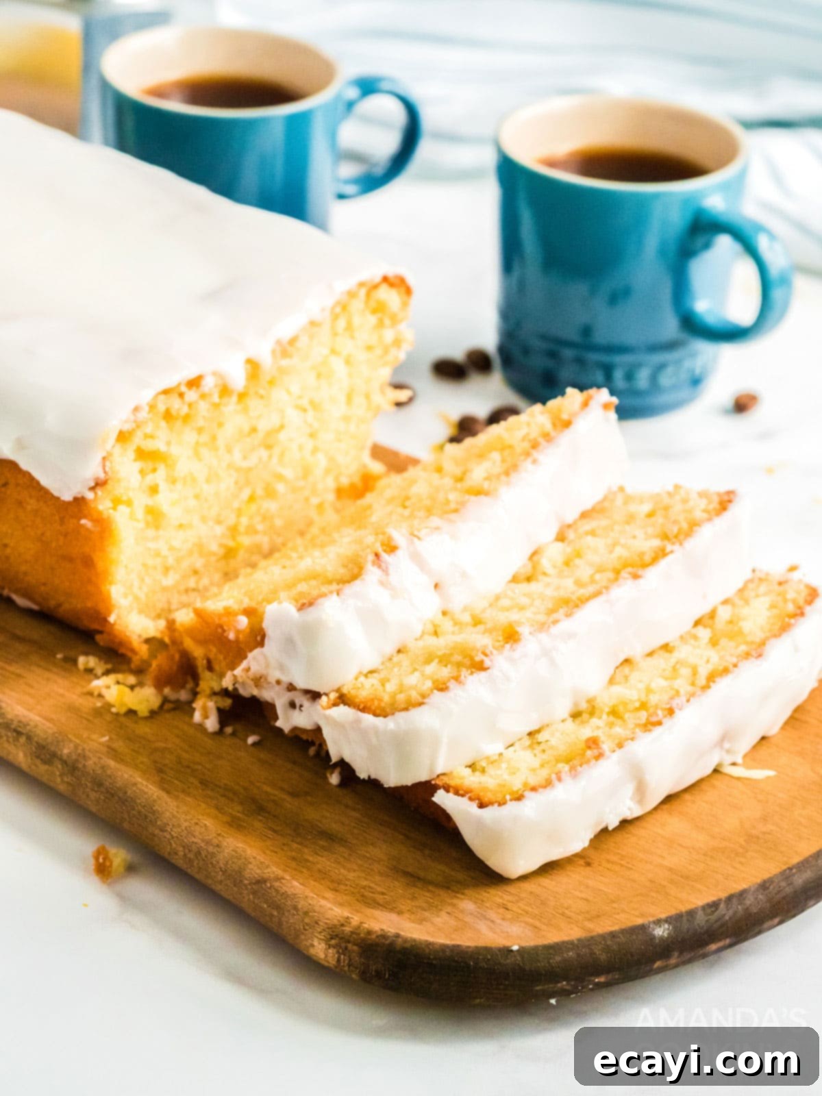 Make the famous Starbucks lemon loaf in your own kitchen. Great for breakfast with coffee, as a snack, or for dessert! sliced lemon loaf cake
