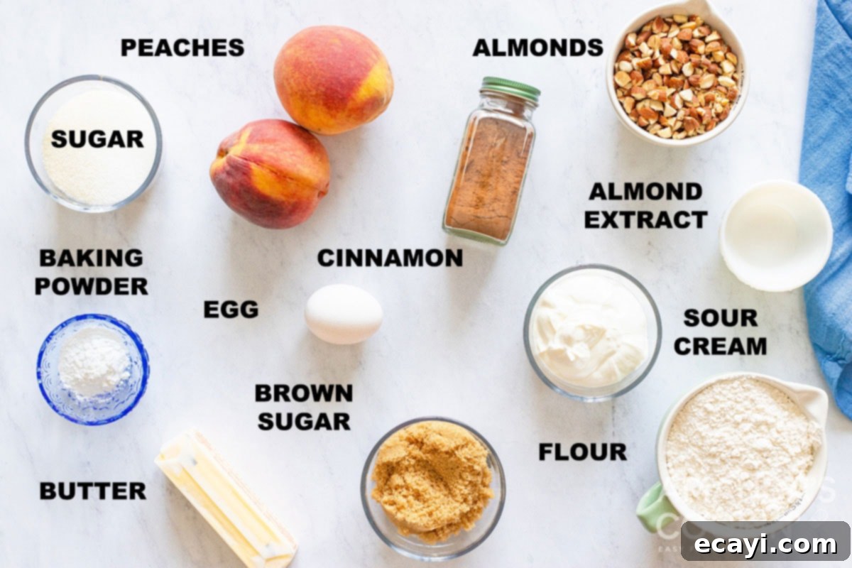 Golden Peach Loaf 2 A collection of labeled ingredients laid out for making homemade peach bread, including flour, sugars, butter, peaches, almonds, and spices.