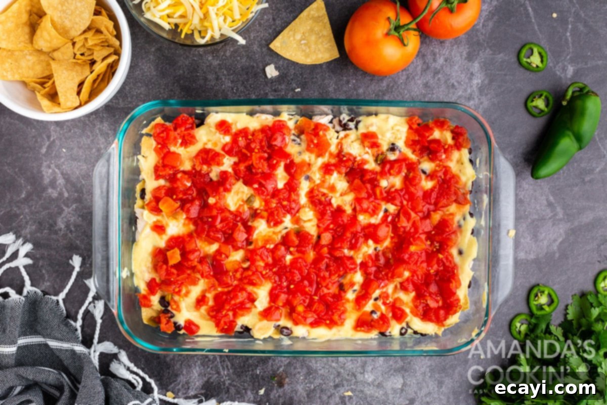 Fiesta Chicken Bake 5 Cream of chicken soup and Rotel tomato layers in a Mexican chicken casserole