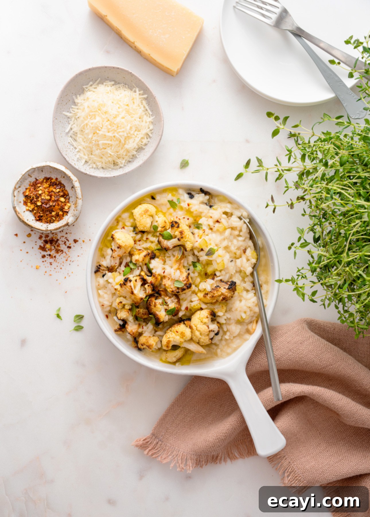 Golden Charred Cauliflower Risotto 3 Broiled Cauliflower Risotto - A delightful blend of crunchy cauliflower and creamy risotto, a true comfort dish.