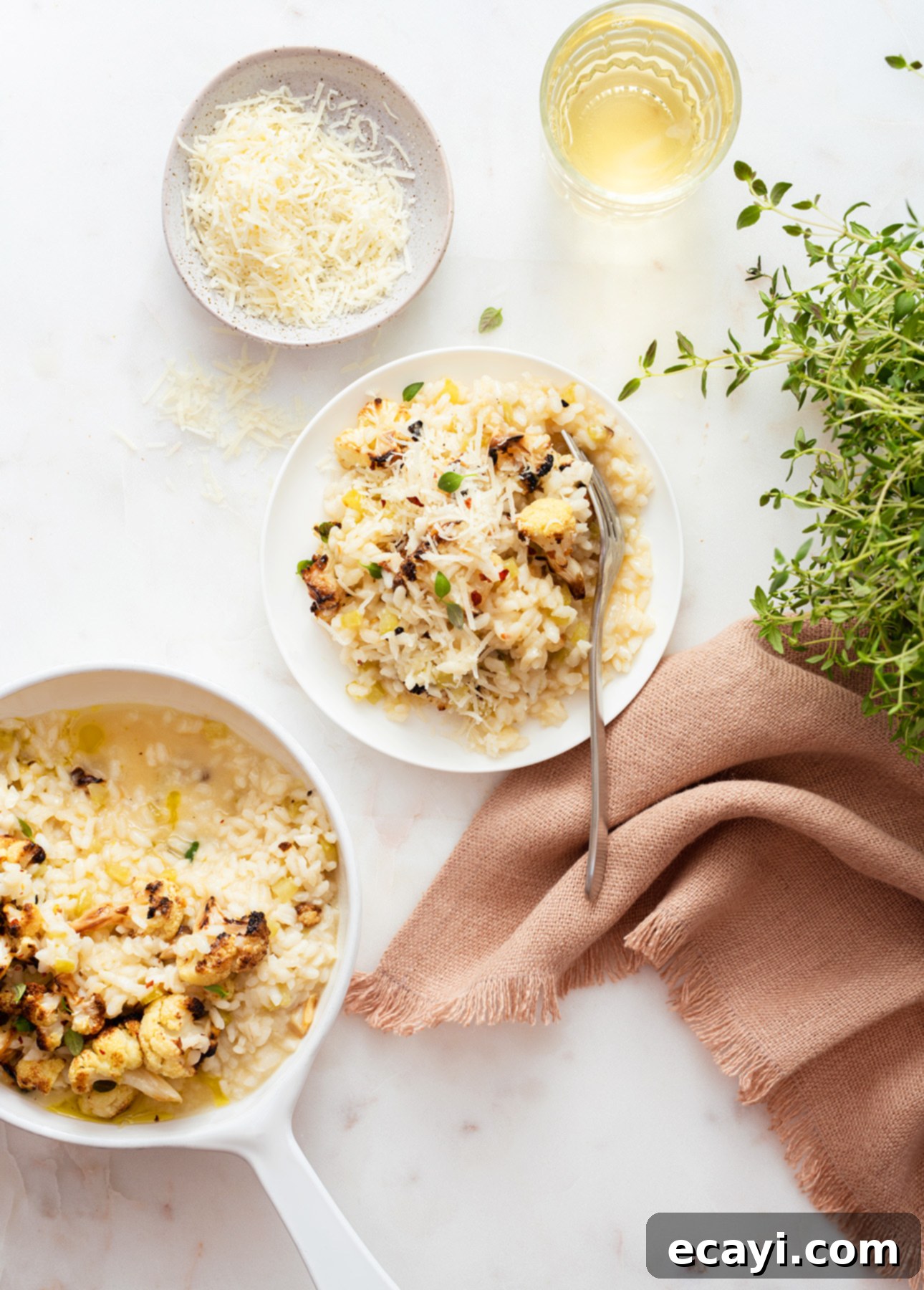 Golden Charred Cauliflower Risotto 5 Broiled Cauliflower Risotto - A close-up view of the delicious, cheesy, and comforting dish.