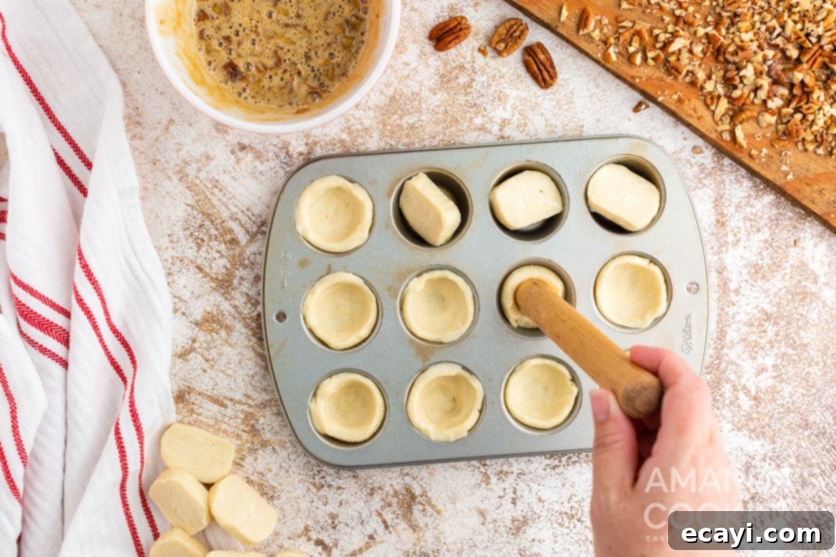 Bite-Sized Pecan Delights 9 pressing dough in muffin tin