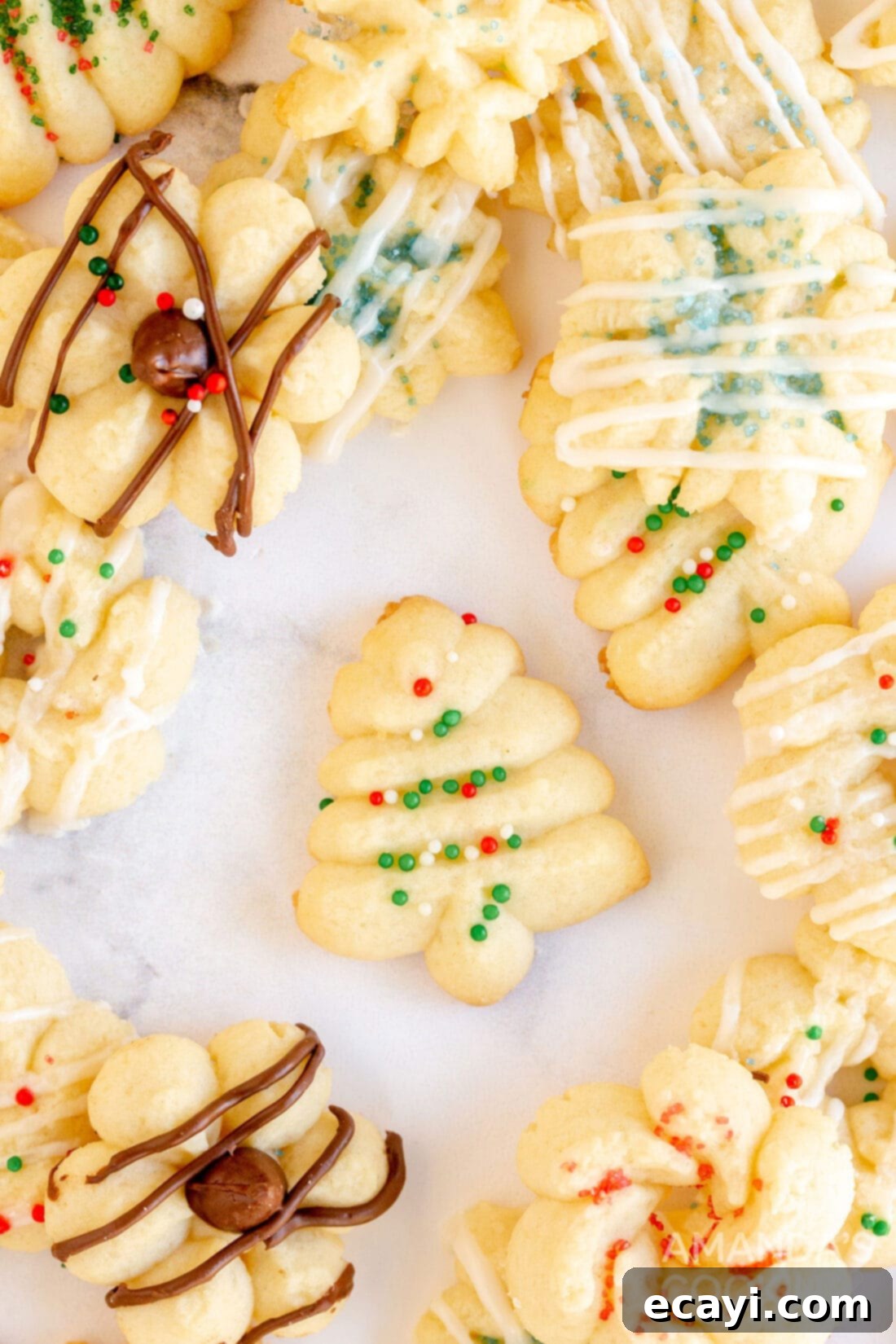 Spritz Cookies 13 An enticing close-up of buttery Spritz cookies, showcasing their intricate designs and perfect golden edges.