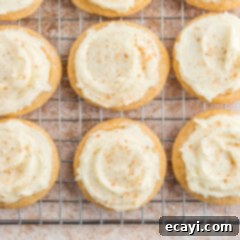 Velvet Eggnog Cookies 14 Close-up of frosted eggnog cookies on a cooling rack, ready to be served