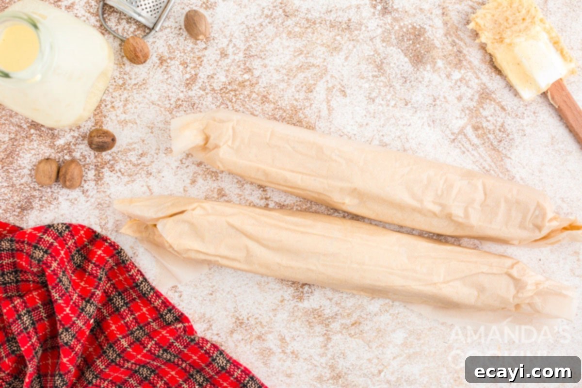 Velvet Eggnog Cookies 7 Two logs of eggnog cookie dough wrapped tightly in wax paper, ready for chilling