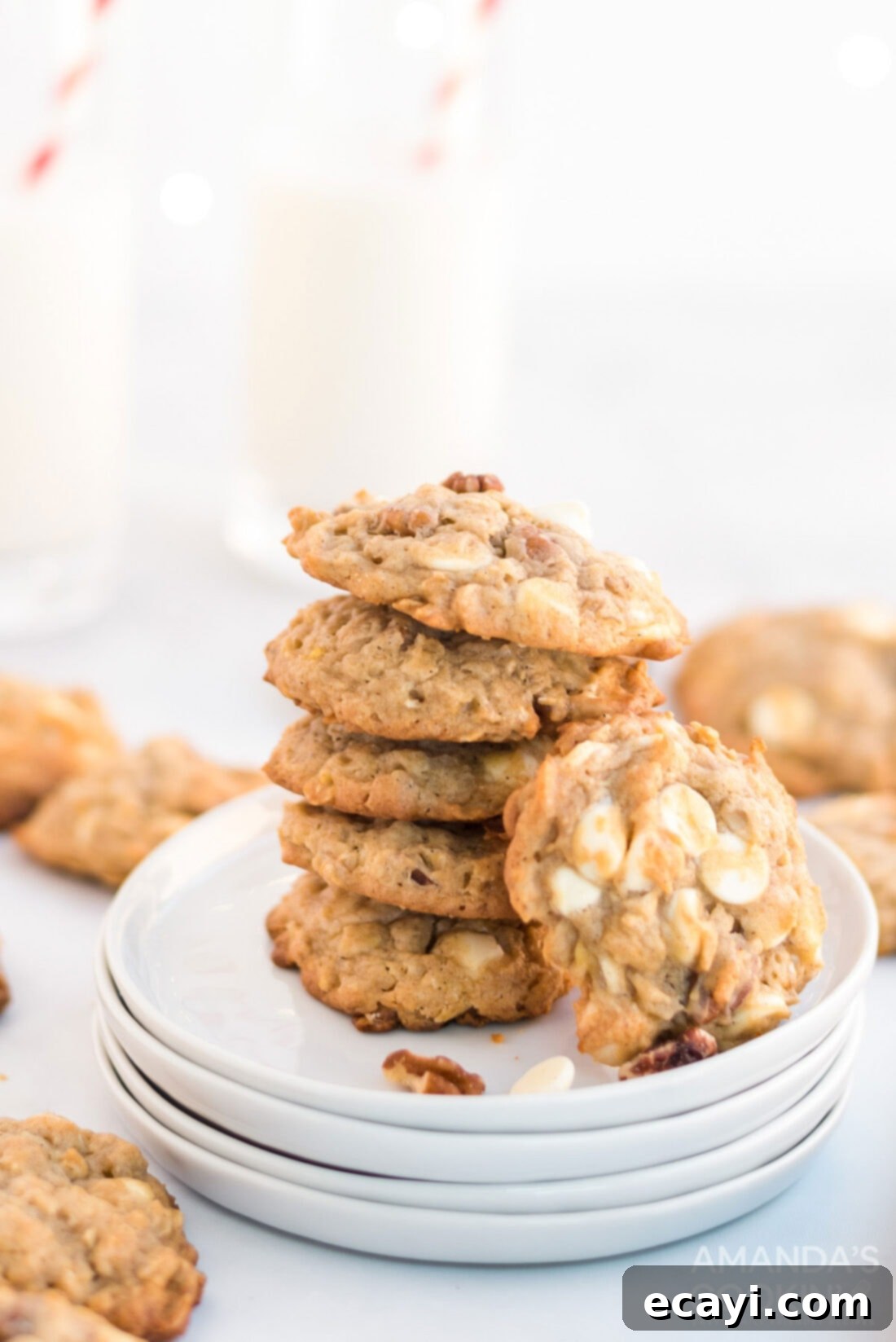 Soft-Baked Banana Cookies 12 A stack of golden brown banana cookies on a plate, ready for serving