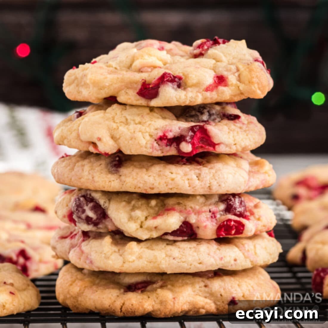 The 2020 Christmas Cookie Countdown: Twelve Days of Sweet Delights 13 Stack of White Chocolate Cranberry Cookies, showcasing the cranberries and white chocolate chunks.