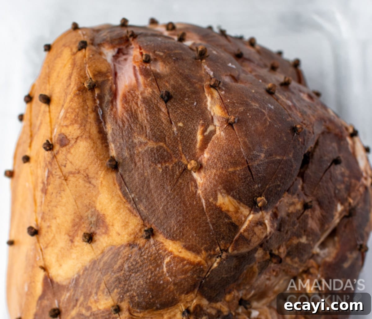 Zesty Orange Bourbon Glazed Ham 5 cloves in ham