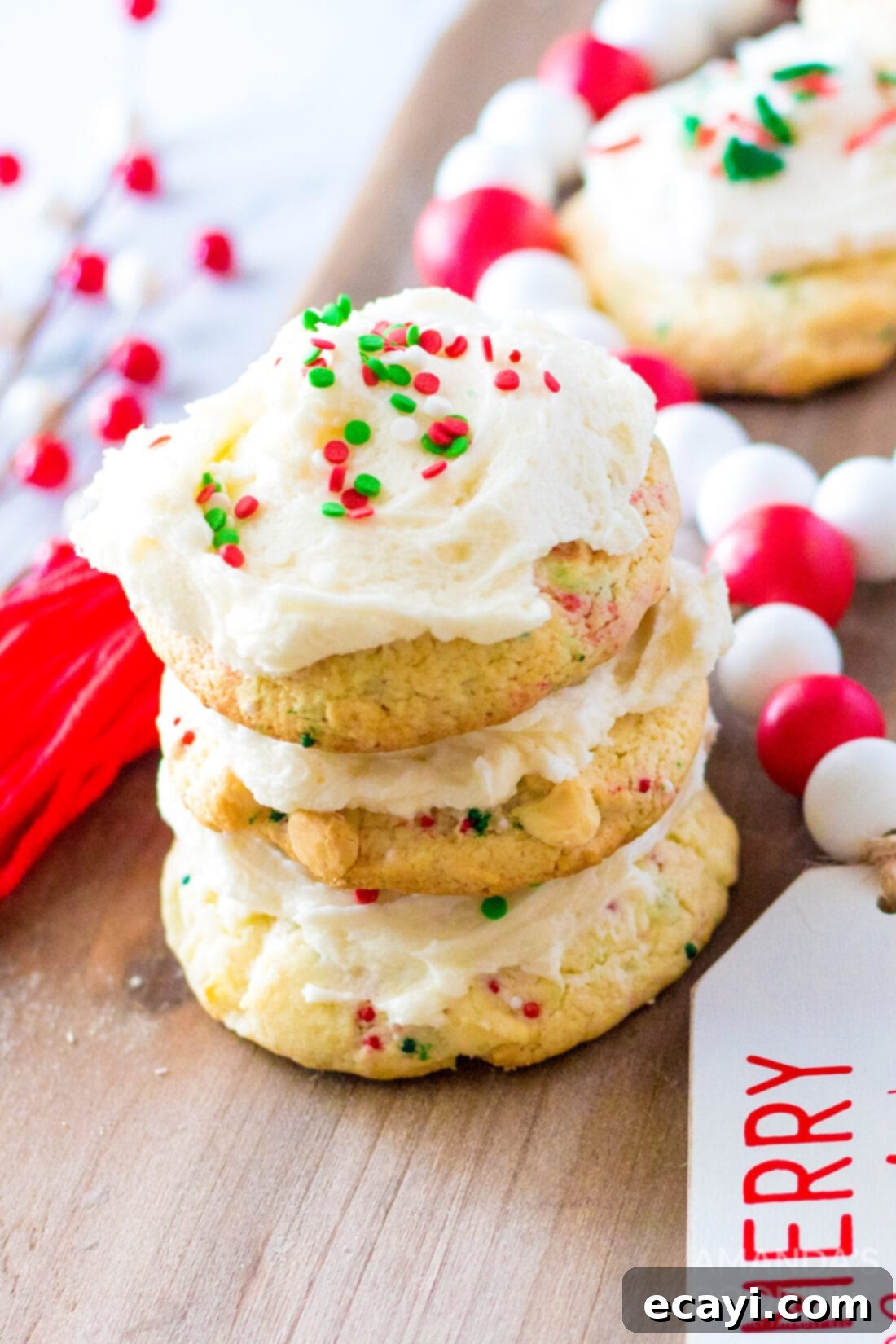 Festive Cake Batter Bites 2 Stack of frosted confetti cake mix cookies with colorful sprinkles