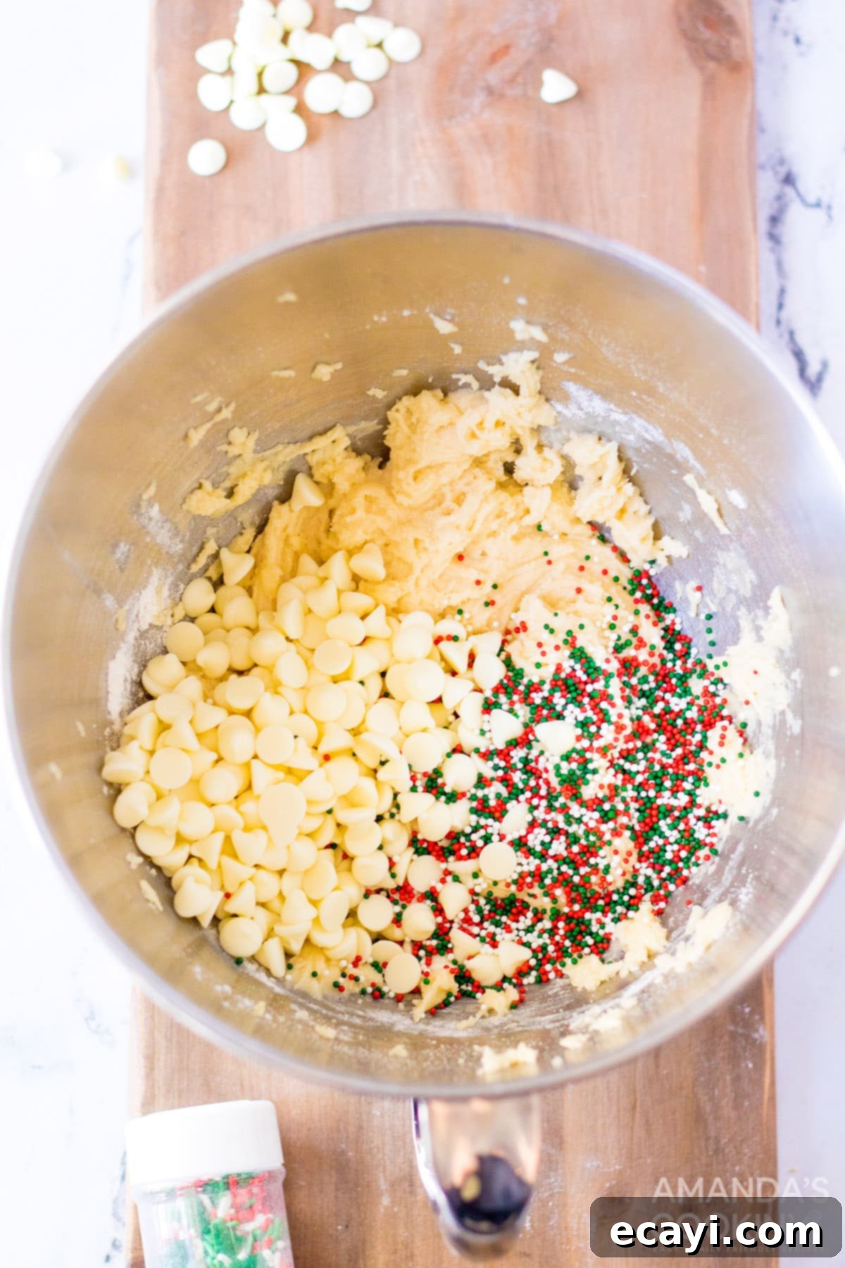 Festive Cake Batter Bites 5 Cake mix cookie ingredients in a bowl being mixed