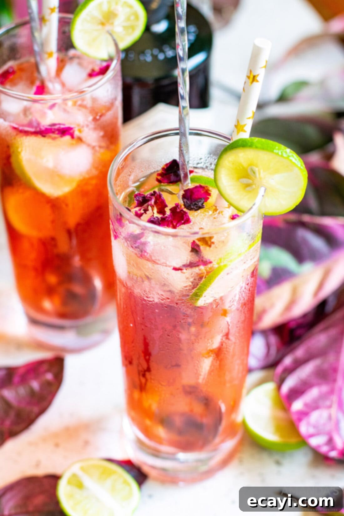 Blush Gin & Tonic 2 Overhead shot of Pink Gin & Tonic and lime garnish and rose petals