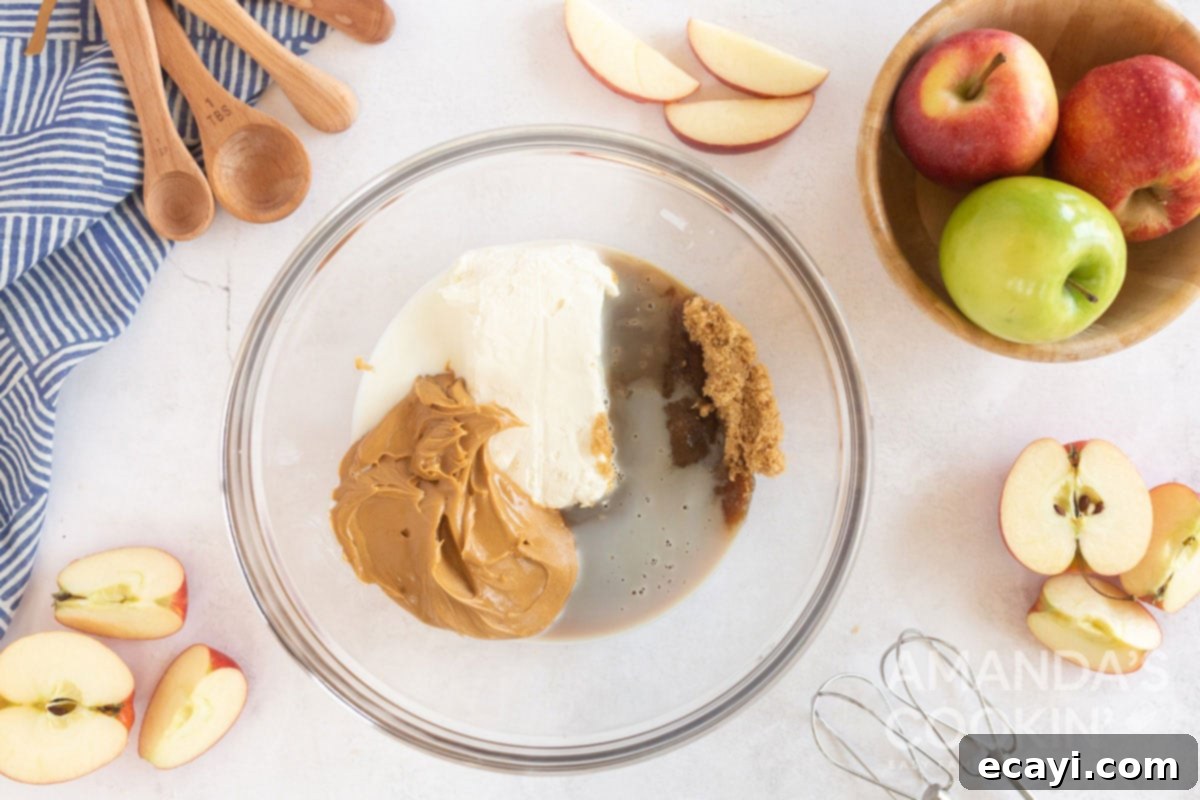 Creamy Peanut Butter Apple Delight 5 peanut butter and cream cheese in a bowl