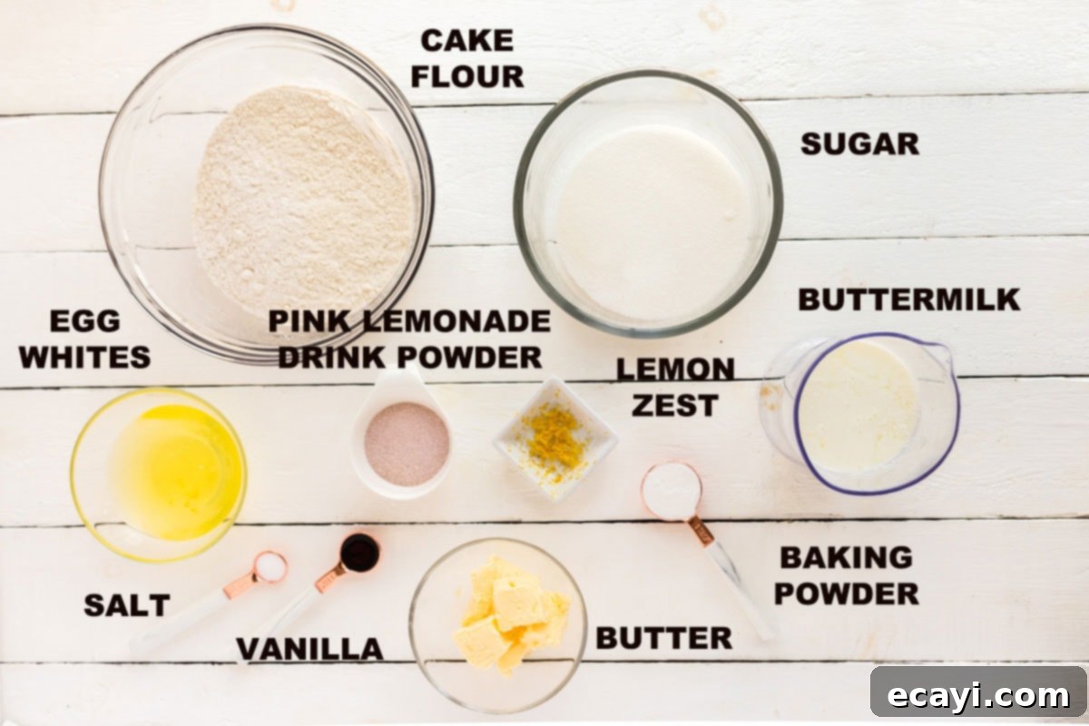 Sparkling Pink Lemonade Cake 2 Carefully laid out ingredients for the pink lemonade cake, including flour, sugar, butter, buttermilk, eggs, and pink lemonade powder, ready for baking.