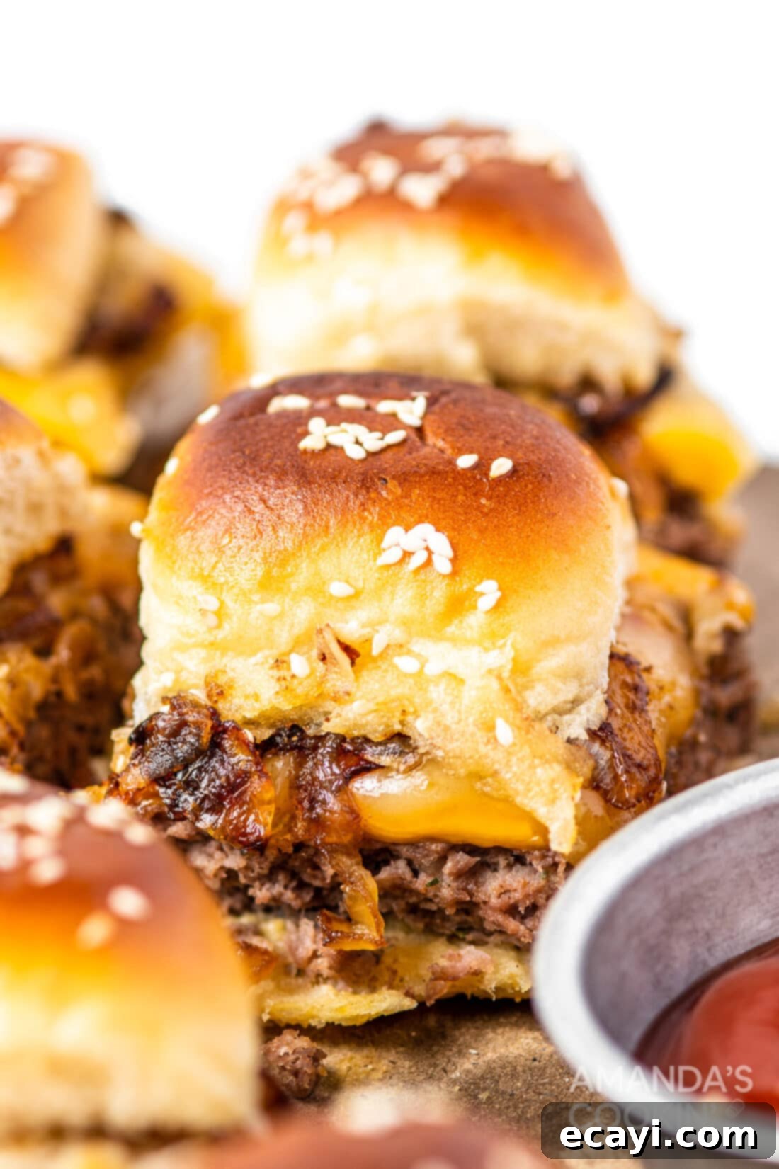 Bite-Sized Cheeseburger Bliss 11 cheeseburger sliders on a tray