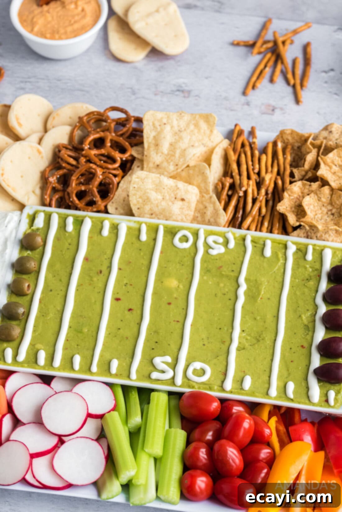 Game Day Grazing Platter 9 Close-up of the football party tray, beautifully arranged with a variety of dips and snacks, ready for guests to enjoy on game day.