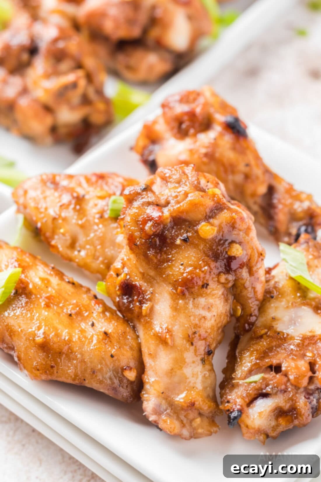 Inferno Wings 3 Close-up of baked spicy wings on a plate, ready to be served