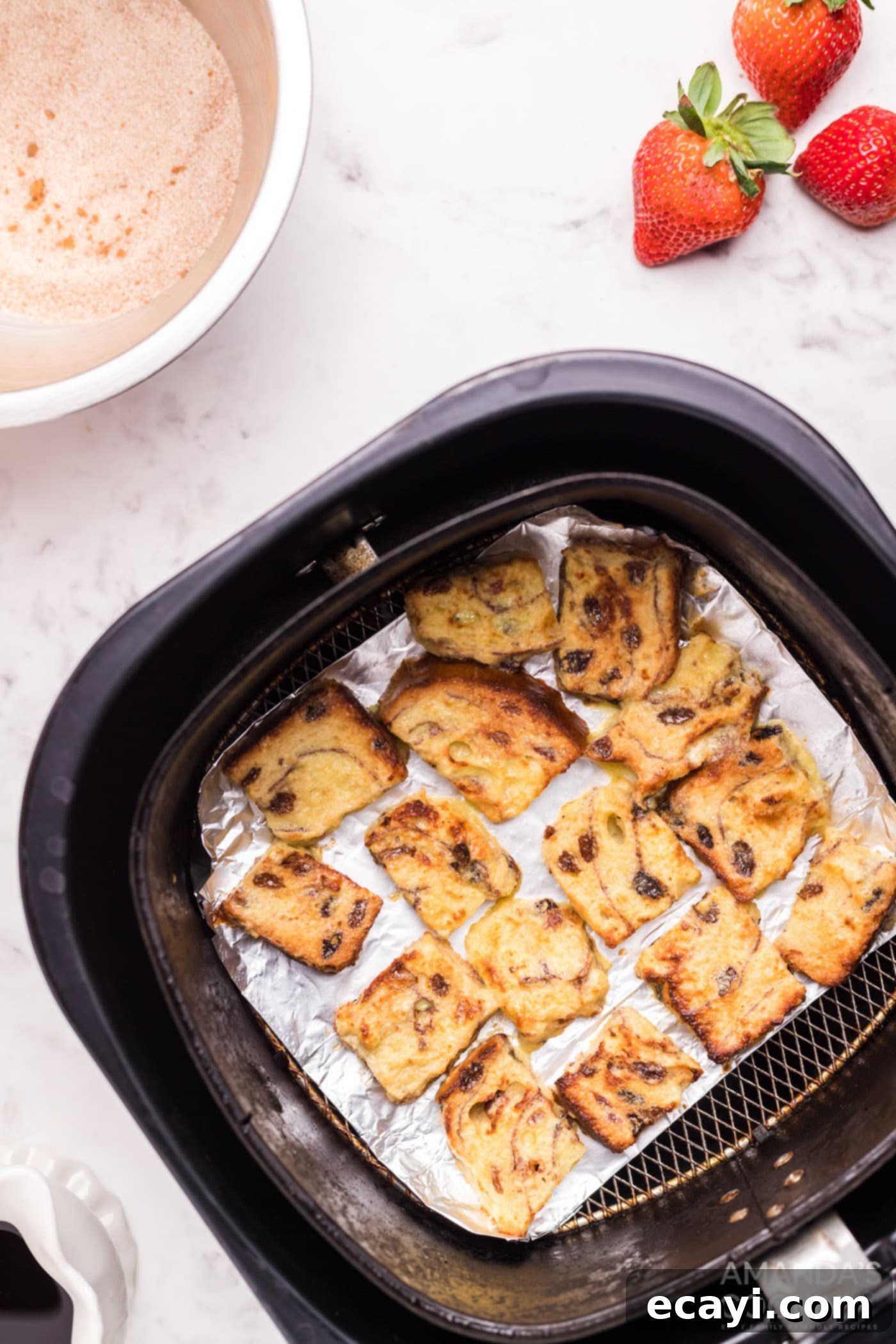 Crispy Air Fryer French Toast Bites 9 cooked french toast in air fryer basket